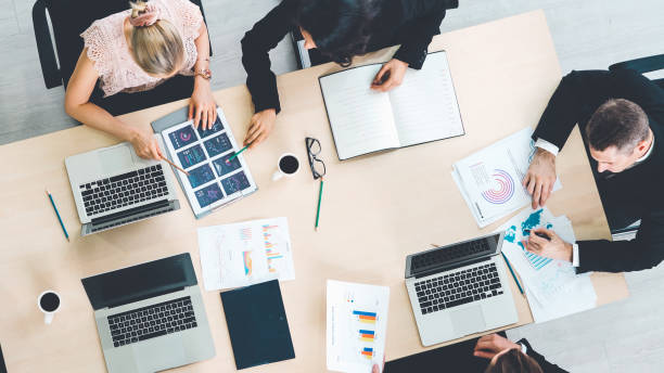 istock Business people group meeting shot from top view 1284201483
