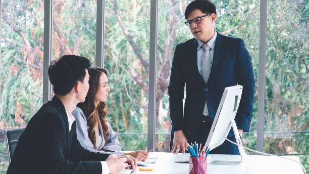 istock Angry business person dispute work problem in group meeting 1284201637
