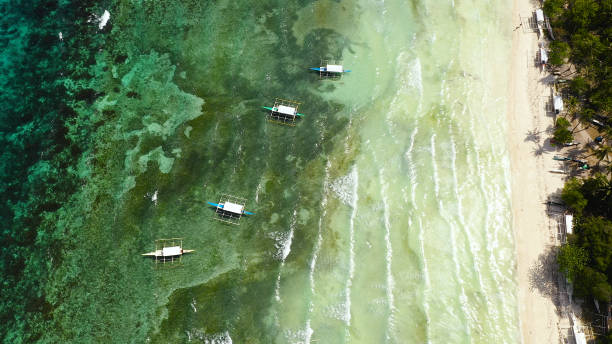 istock Sandy beach and tropical sea. Panglao island, Philippines 1284202972