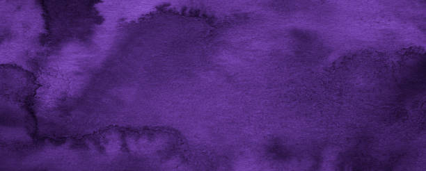 istock Purple patchy watercolor background. Abstract violet background drawn by hand with a brush. Watercolor texture. 1284204575