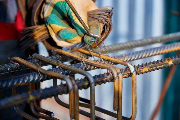 istock Tying reinforcing steel bars rebar for the construction. 1284211227