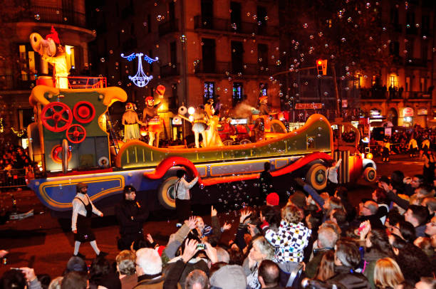 Cavalcade of Magi in Barcelona, Spain Barcelona, Spain - January 5, 2015: The Cavalcade of Magi in Barcelona, Spain. The Magi and their servants parade in floats by the main streets of the city festival float stock pictures, royalty-free photos & images