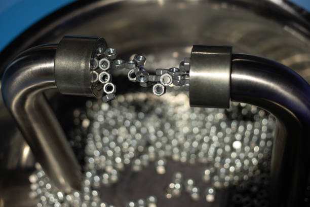 istock Educational experiments with a magnetic field, nuts and screws are magnetized by a huge magnet. 1284212166