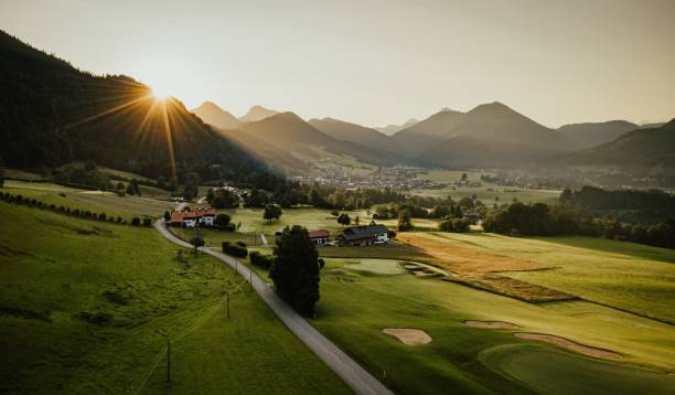 Aerial drone shot from a sunrise in the mountains of Kössen, Tyrol Austria Aerial drone shot from a sunrise in the mountains of Kössen, Tyrol Austria tyrol state stock pictures, royalty-free photos & images