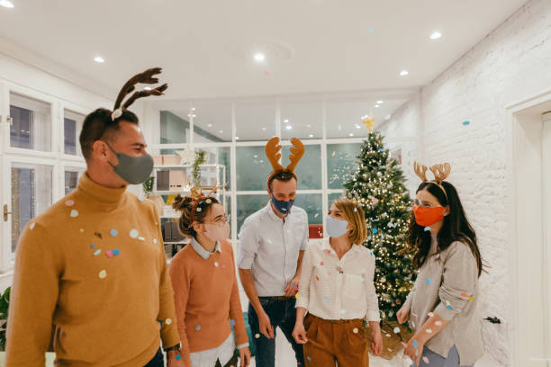 istock New Year's celebration in the office during Coronavirus pandemic 1284215900