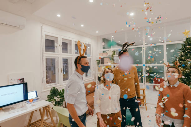 istock New Year's celebration in the office during Coronavirus pandemic 1284216013
