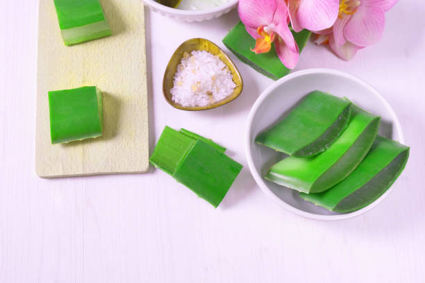 istock preparing a face mask from medicated aloe vera on white background 1284220900