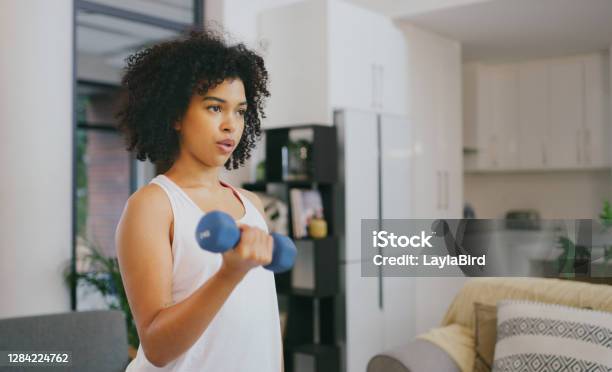 Your Body Wont Go Where Your Mind Doesnt Push It Stock Photo - Download Image Now - Curly Hair, Bicep, Exercising