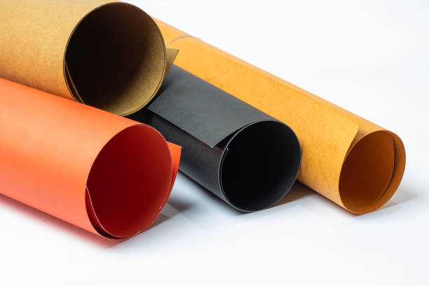 istock Abstract rolled colorful multicolor textured art papers isolated on white background 1284227404