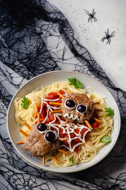 istock Cutlet look like a spider with pasta 1284229518