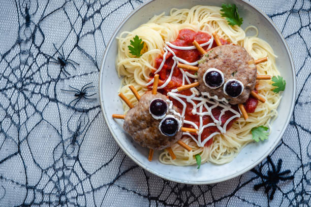 istock Cutlet look like a spider with pasta 1284229545