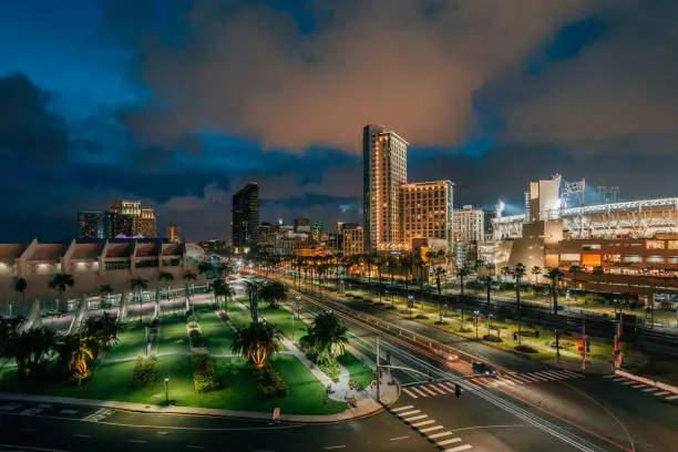 Cityscape view of the downtown San Diego skyline and Harbor Drive at night, in San Diego, California