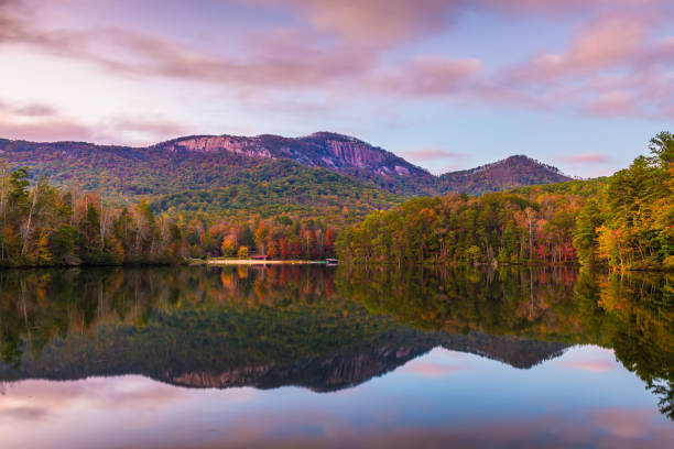 Table Rock Mountain, Pickens, South Carolina, USA lake view in autumn at dusk.