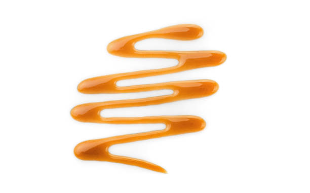 istock Delicious sweet caramel topping 1284240413