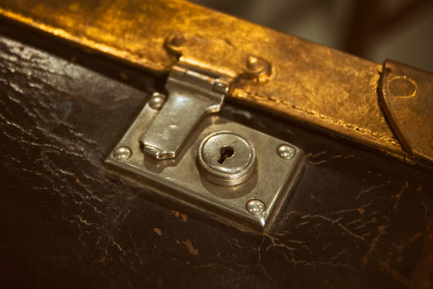 istock Close Up Shot Of A Vintage Leather Suitcase Lock 1284247384