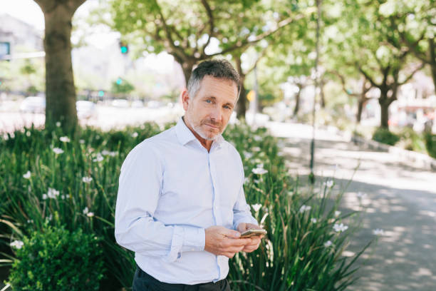 istock Businessman at the park 1284253253