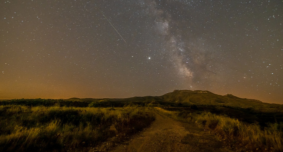 A meteor crosses the night sky during the Perseid star shower in the Spanish skies.
