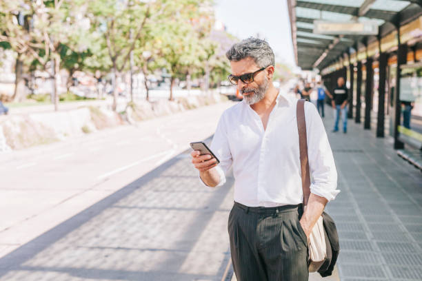 istock Businessman waiting for the bus 1284253277