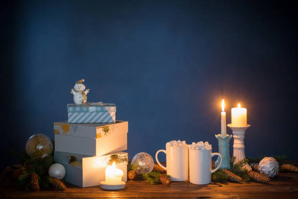 istock two white cups with drinks with marshmallows and christmas decorations on dark background 1284256055