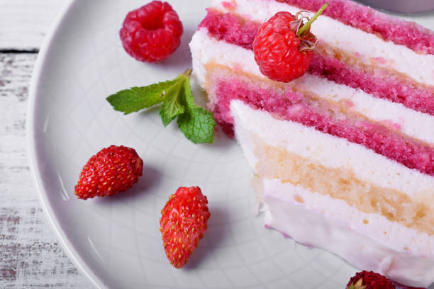 istock Piece of cake with many layers topped with fresh berries 1284258146
