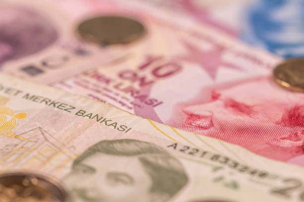 istock Turkish lira TL. TRY banknotes and coins 1284260848