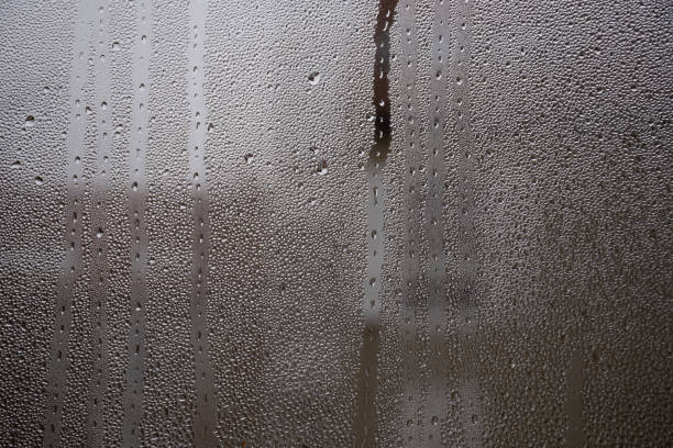 istock Water Condensation on a Window Pane 1284262293