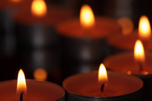 istock Several burning candles. The atmosphere of a holiday, romance. 1284262393