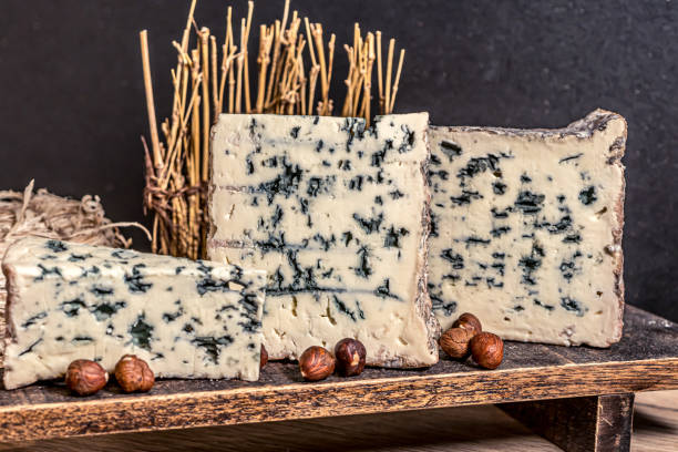 istock Cheese roquefort. Rustic closeup on soft black background. Healthy food background. Hight quality photo 1284262473