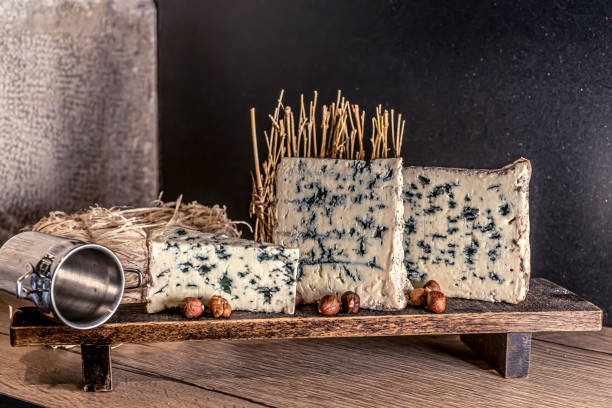 istock Cheese roquefort. Rustic closeup on soft black background. Healthy food background. Hight quality photo 1284262478