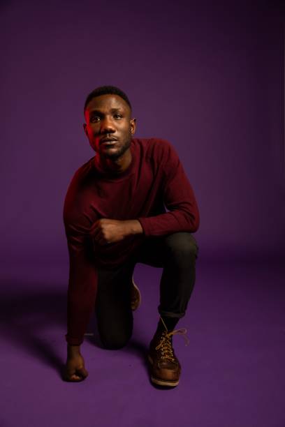 istock Black Man with Fist on Floor 1284264868