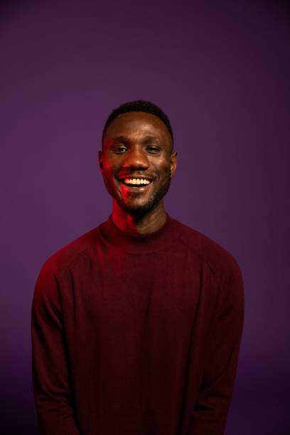 istock African Man Smiling for Camera on Isolated Background 1284265028