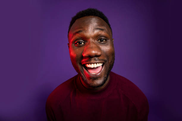 istock Young Man Smiling with Mouth Wide Open 1284265297