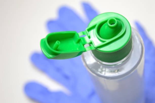istock medical gloves and jar with sanitizer. 1284267700