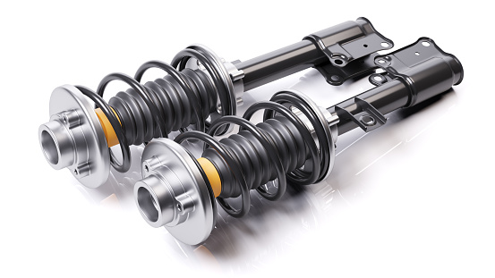 Pair of car shock absorbers with springs. Suspension components. 3D render