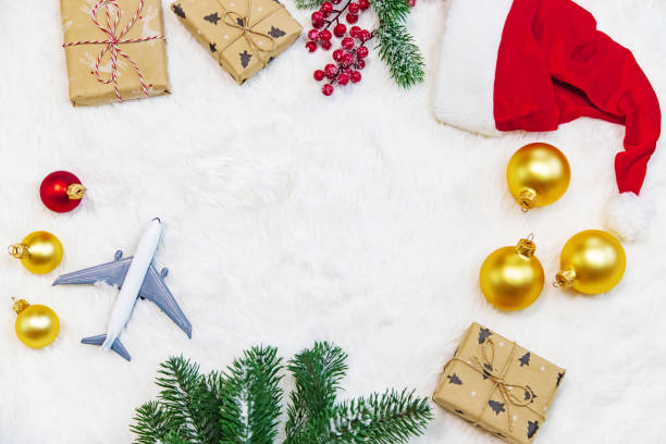 istock Travel for Christmas. Airplane with Christmas decor. Selective focus. 1284269154