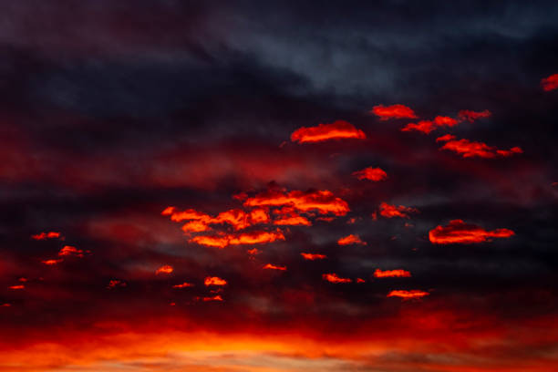 istock A great sunset sky crossed by red clouds 1284269172