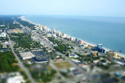 Myrtle Beach,South Carolina, USA - November 4, 2014: Aerial View of the oceanfront condominiums, resorts, hotels and shops along the Grand Strand of Myrtle Beach, South Carolina. Myrtle Beach is a major center of tourism in the United States that attracts an estimated 14 million visitors each year. After the effects of several hurricanes, the city is reinventing itself with new developments and attractions.
