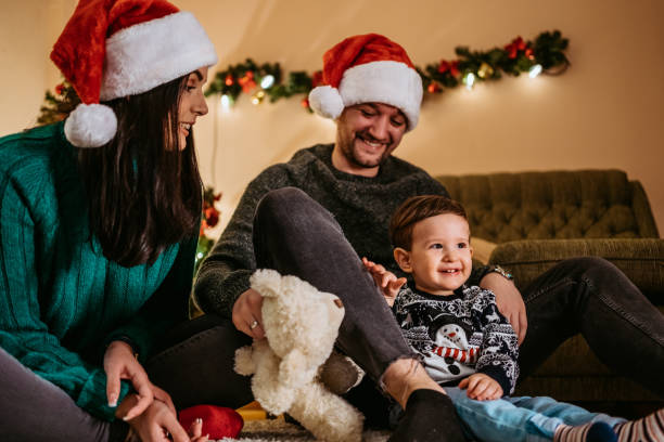istock Happy parents and their son for Christmas 1284276596