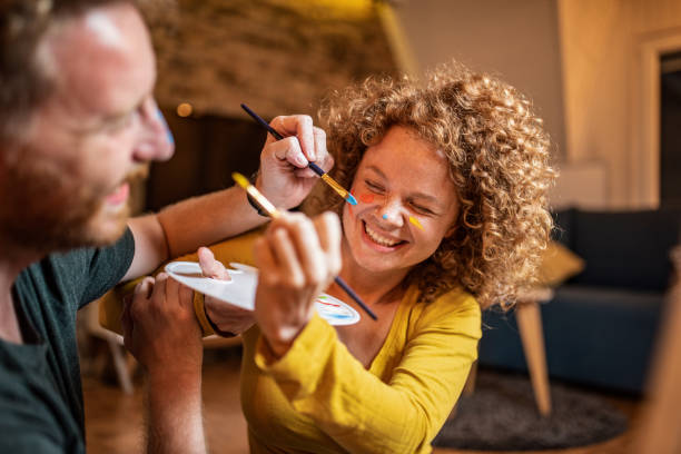 istock Playful ginger couple having fun at home. 1284279898