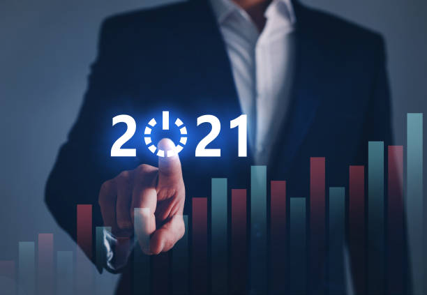 Businessman pointing START future button of year 2021 with digital graph. Development to success and growing growth concept.