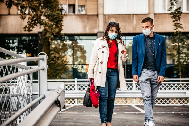 Business coworkers walking at parking garage