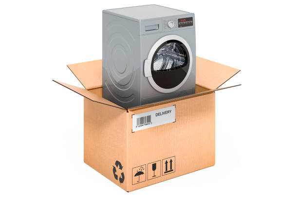 istock Tumble dryer inside cardboard box, delivery concept. 3D rendering isolated on white background 1284282937