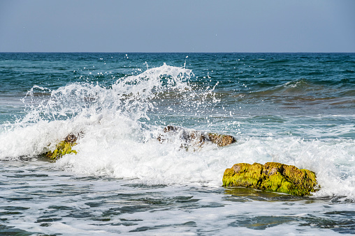 Waves splashing on the shore in Turkey.