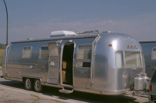 South Dakota, USA, 1981. Airstream trailer at a freeway stop.