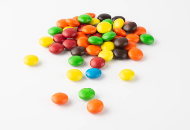 istock Group of colorful candies over white background 1284289931
