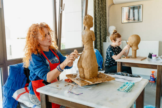 People making sculptures in art studio People making sculptures in art studio artist sculptor stock pictures, royalty-free photos & images