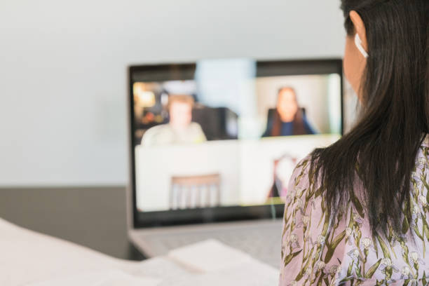 istock Unrecognizable elementary school teacher teaches online students 1284291190