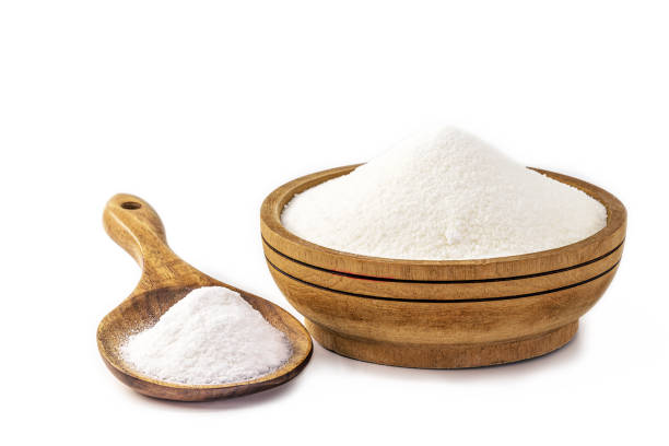istock sodium bicarbonate on isolated white background, chemical compound in crystalline powders, used as antacid or yeast 1284291418