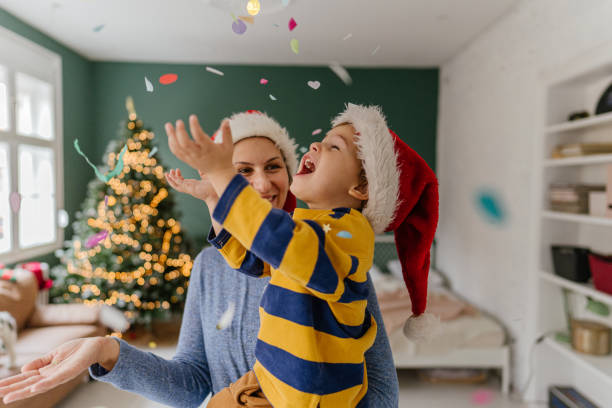 istock Single mom celebrates Christmas with her boy 1284292663