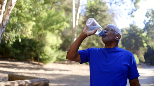 Senior African American Man Drinking Water